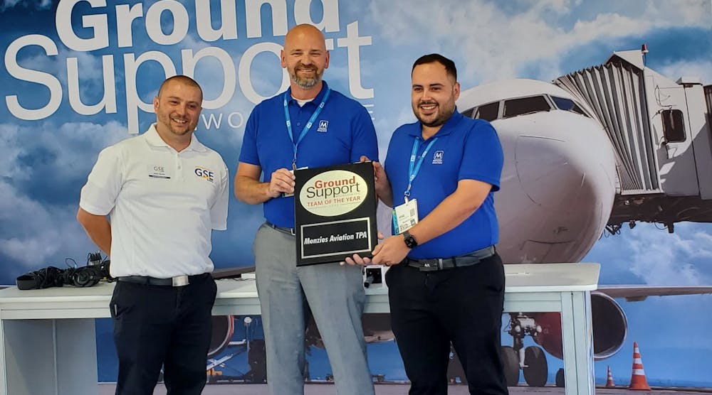 Ground Support Worldwide editor Josh Smith (at left) poses for a photo with John Vollbrecht and Jose Valenzuela from Menzies TPA, winner of the first Ground Support Team of the Year award.