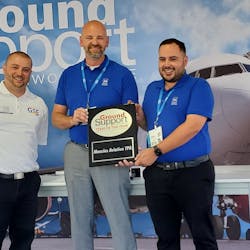 Ground Support Worldwide editor Josh Smith (at left) poses for a photo with John Vollbrecht and Jose Valenzuela from Menzies TPA, winner of the first Ground Support Team of the Year award.