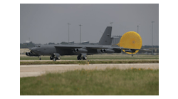 A B-52 Stratofortress arrives at Joint Base San Antonio. The aircraft will undergo instillation of an upgraded radar system manufactured by RTX.