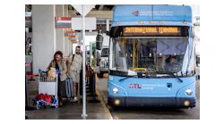 Passengers board the terminal-to-terminal shuttle at the international terminal on Tuesday, Sept. 29, 2023.
