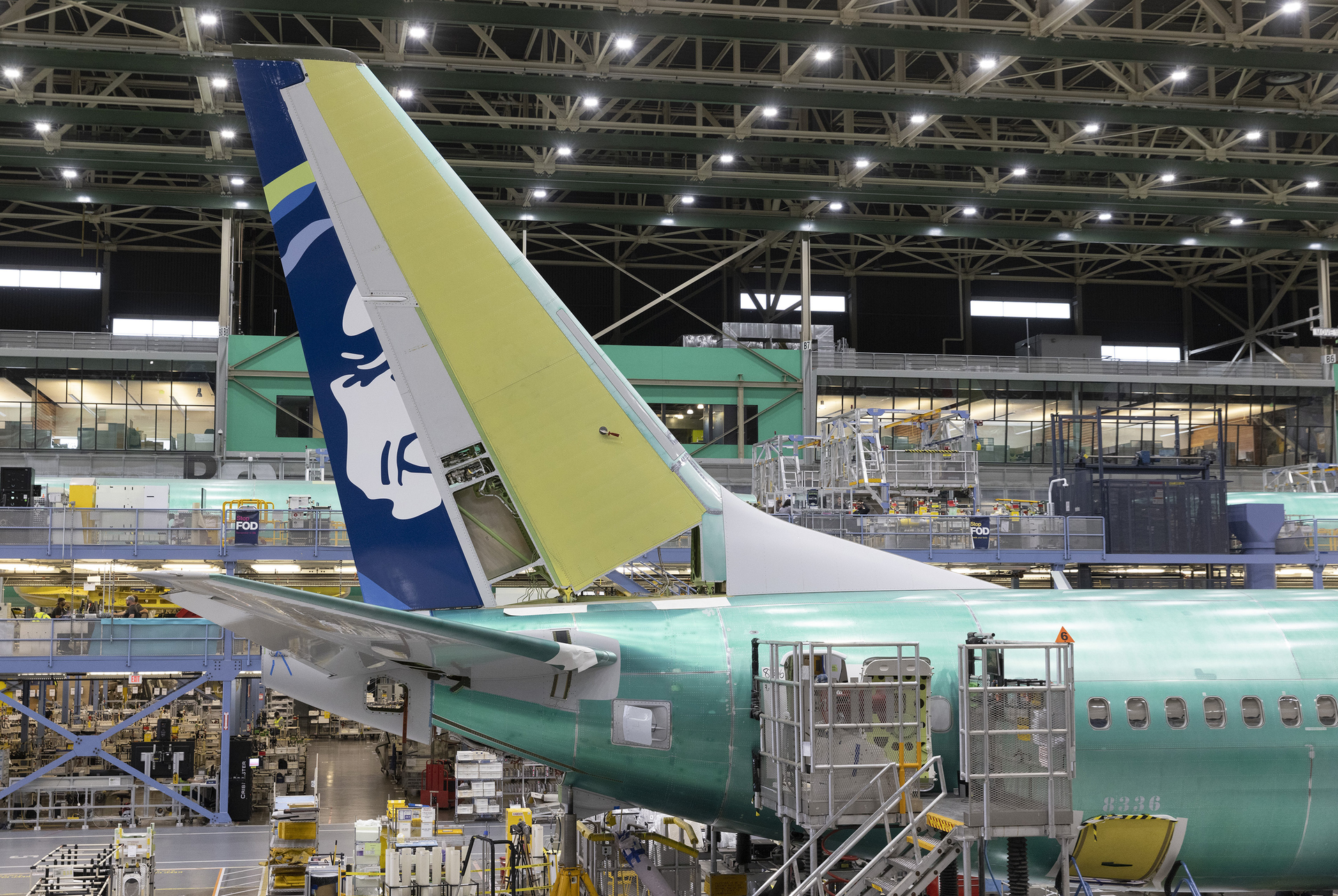 Boeing employees work on the 737 MAX on the final assembly line at Boeing&rsquo;s Renton plant, June 15, 2022, in Washington.