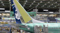 Boeing employees work on the 737 MAX on the final assembly line at Boeing’s Renton plant, June 15, 2022, in Washington.