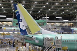 Boeing employees work on the 737 MAX on the final assembly line at Boeing’s Renton plant, June 15, 2022, in Washington. Boeing employees work on the 737 MAX on the final assembly line at Boeing’s Renton plant, June 15, 2022, in Washington.