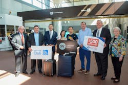 (Left to Right): William Sudow, Airports Authority board chair; Henry Bird, United managing director; Randy Clarke, Metro general manager and CEO; Ivy Cheng; Chao Pen; Matt Letourneau, Metro board of directors; Jack Potter, Airports Authority president and CEO; Kate Hanley, Airports Authority board of directors.