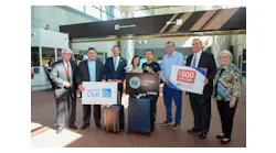 (Left to Right): William Sudow, Airports Authority board chair; Henry Bird, United managing director; Randy Clarke, Metro general manager and CEO; Ivy Cheng; Chao Pen; Matt Letourneau, Metro board of directors; Jack Potter, Airports Authority president and CEO; Kate Hanley, Airports Authority board of directors.