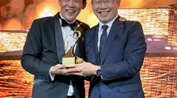 Hactl chief executive Wilson Kwong (right) receives the “Air Cargo Terminal Operator of the Year” award at the gala dinner.