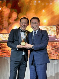 Hactl chief executive Wilson Kwong (right) receives the &ldquo;Air Cargo Terminal Operator of the Year&rdquo; award at the gala dinner.