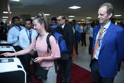 Passengers try out SriLankan Airlines&rsquo; new self-service channel in the departure terminal of Bandaranaike International Airport as officials of the airline and airport and aviation services watch on following the channel&rsquo;s launch on Nov. 14, 2023.