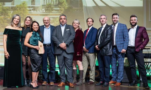 LAWA&rsquo;s Deputy Executive Director for Shared Services, Crystal Lee, accepts USGBC-LA&rsquo;s Energy and Operational Carbon Design Merit award for LAX&rsquo;s ConRAC Facility alongside members of the project team. Photo by Ling Luo.