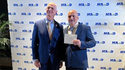 MIA Director Ralph Cutie and Employee of the Year Roberto Mayol MIA Director Ralph Cutie and Employee of the Year Roberto Mayol