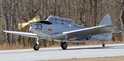 A WWII PT-19 Cornell trainer initially used by Tuskegee Airmen takes off for its first flight after two years of complete restoration by CAF Airbase Georgia members.