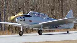 A WWII PT-19 Cornell trainer initially used by Tuskegee Airmen takes off for its first flight after two years of complete restoration by CAF Airbase Georgia members.