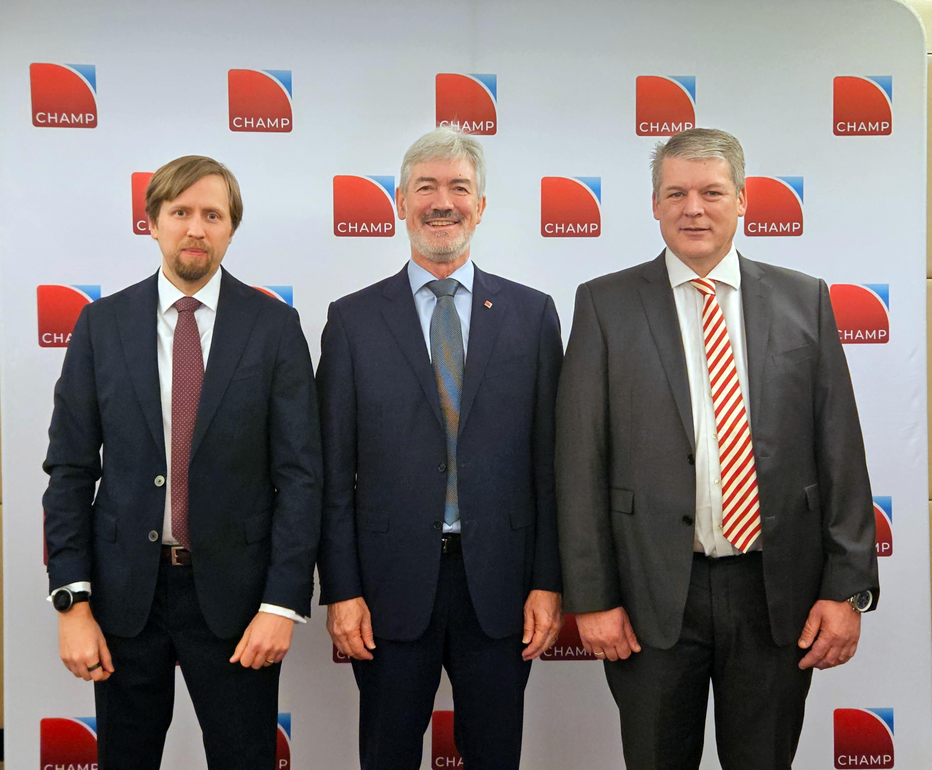 From left, Jussi Lemola, Vice President, Global Operations - Cargo at Swissport, CHAMP CEO Chris McDermott, and Andrew Wareham, Manager Global Operations at Swissport.