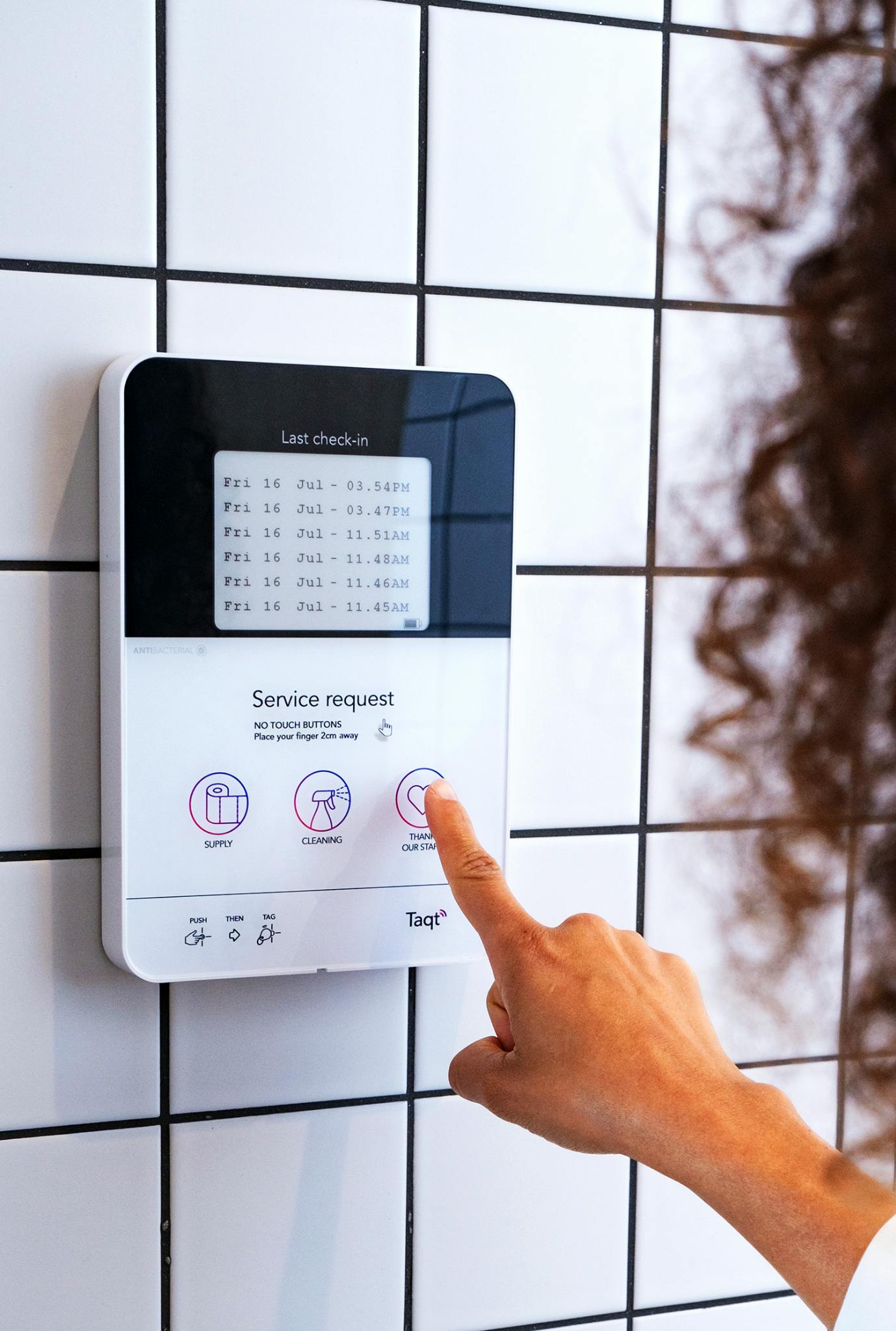 TaqtOne provides user feedback options to report restroom service needs, along with staff traceability