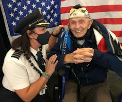 Capt. Grechman and Naval Chief Petty Officer Higgins in 2021 flying home after being an honored guest at the Pearl Harbor 80th anniversary commemorative ceremony. Capt. Grechman and Naval Chief Petty Officer Higgins in 2021 flying home after being an honored guest at the Pearl Harbor 80th anniversary commemorative ceremony.
