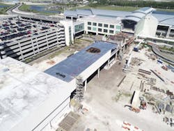 Orlando International Airport (MCO) Construction of Terminal C Multi-Modal Connector Pedestrian Bridge. Funding was provided through the Bipartisan Infrastructure Law.