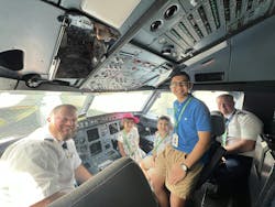 MIAair participants in the cockpit with the GlobalX flight crew. MIAair participants in the cockpit with the GlobalX flight crew.