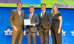 Hactl Executive Director &ndash; Operations, Paul Cheng (2nd from left), and Head of Safety, Sustainability and Quality Assurance Benny Siu (3rd from left), receive the Certificate of Recognition under the &ldquo;IATA Enhanced GSE Recognition Program&rdquo; at IGHC.