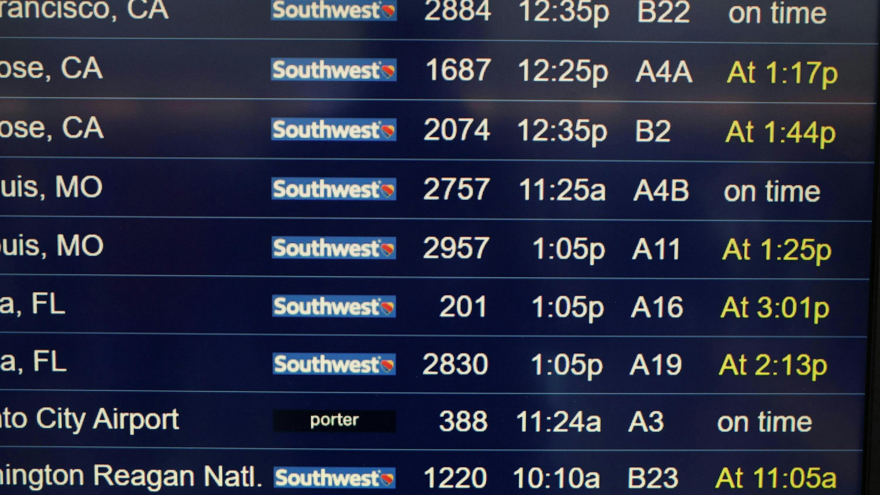 A flight information board shows delayed Southwest Airlines flights at Chicago Midway International Airport on April 18, 2023, in Chicago.