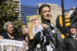 Catherine Berthet holds a photo of her daughter, Camille Geoffroy, after she and other relatives of those killed in two Boeing 737 Max crashes spoke at a federal court arraignment in Fort Worth, Texas, in January 2023. Catherine Berthet holds a photo of her daughter, Camille Geoffroy, after she and other relatives of those killed in two Boeing 737 Max crashes spoke at a federal court arraignment in Fort Worth, Texas, in January 2023.