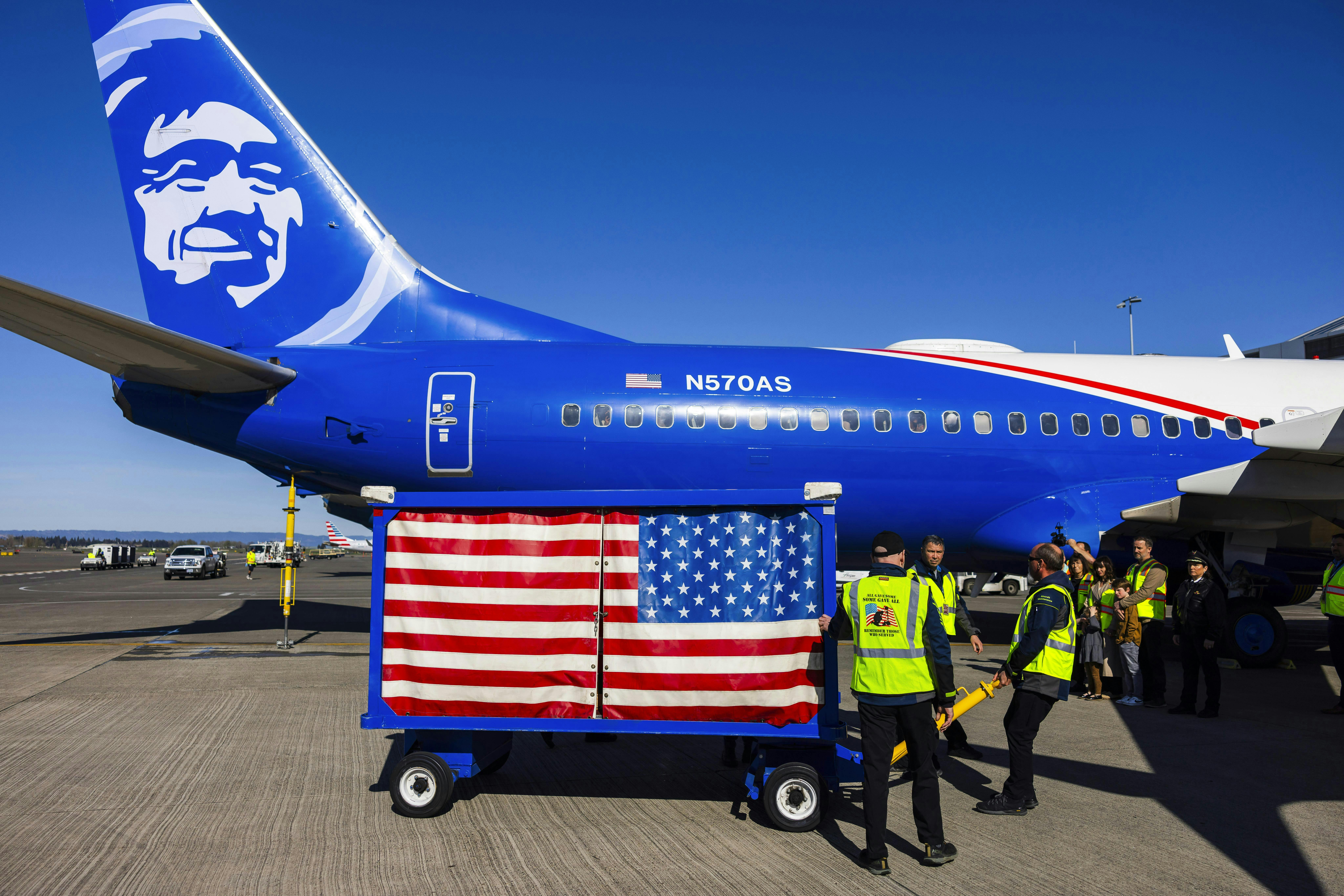 Alaska Airlines Fallen Soldier delivered casket to a waiting aircraft via a special Fallen Soldier Cart. The fallen soldier was Navy Chief Petty Officer Richard Clyde Higgins, who was one of the last Pearl Harbor survivors.