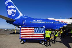 Alaska Airlines Fallen Soldier delivered casket to a waiting aircraft via a special Fallen Soldier Cart. The fallen soldier was Navy Chief Petty Officer Richard Clyde Higgins, who was one of the last Pearl Harbor survivors.