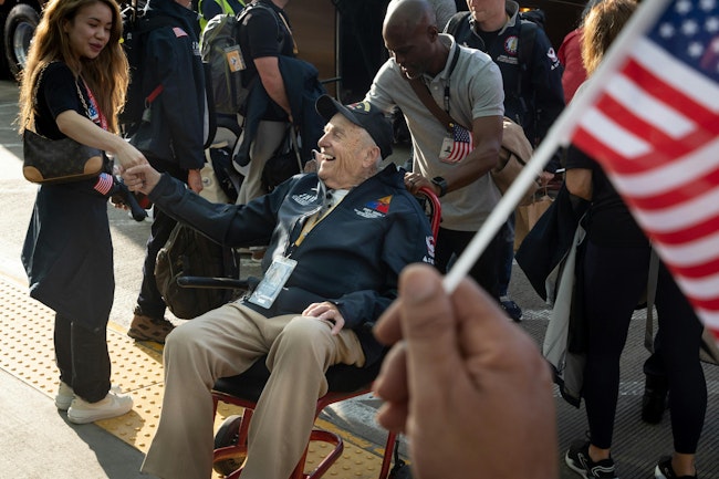 World War II veteran Andy Negra Jr. of Helen arrives for a Delta charter flight to Normandy at the Hartsfield- Jackson international terminal in Atlanta on Sunday, June 2, 2024. Delta and Best Defense Foundation flew more than 40 WWII veterans to Normandy to commemorate the 80th anniversary of D-Day.