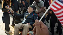 World War II veteran Andy Negra Jr. of Helen arrives for a Delta charter flight to Normandy at the Hartsfield- Jackson international terminal in Atlanta on Sunday, June 2, 2024. Delta and Best Defense Foundation flew more than 40 WWII veterans to Normandy to commemorate the 80th anniversary of D-Day.
