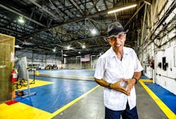 Armando Martinez, former vice president for flight operations at Miami Air International, showed off the interior of a 1929 hangar built by legendary Pan American Airways founder Juan Trippe at Miami International Airport in 2023. Martinez is part of a group asking Miami-Dade County to designate the hangar, the oldest standing structure at the airport, as a historic landmark.