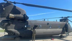 A 101st Combat Aviation Brigade Flight Engineer conducts pre-flight checks of the Chinook CH-47F Block II. A 101st Combat Aviation Brigade Flight Engineer conducts pre-flight checks of the Chinook CH-47F Block II.