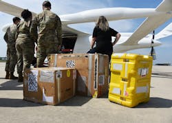 Alyxandra Scalone, 305th Maintenance Squadron Production Controller (right), and her Precision Measurement Equipment Laboratory team prepare to load cargo on BETA Technologies’ prototype, ALIA CTOL, a battery-powered fixed-wing aircraft at Joint Base McGuire-Dix-Lakehurst, N.J., July 9, 2024. This is the first demonstration of the aircraft’s cargo capabilities. BETA partnered with AFWERX Agility Prime to test the capabilities of moving cargo between bases in a safer, cleaner, and more cost-effective way. Alyxandra Scalone, 305th Maintenance Squadron Production Controller (right), and her Precision Measurement Equipment Laboratory team prepare to load cargo on BETA Technologies’ prototype, ALIA CTOL, a battery-powered fixed-wing aircraft at Joint Base McGuire-Dix-Lakehurst, N.J., July 9, 2024. This is the first demonstration of the aircraft’s cargo capabilities. BETA partnered with AFWERX Agility Prime to test the capabilities of moving cargo between bases in a safer, cleaner, and more cost-effective way.