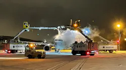 Removing ice from aircraft involves careful movement of machinery and personnel with caution during hostile outdoor conditions.