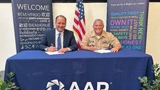 Frank Landrio, AAR’s Senior Vice President of Distribution, and Captain Dale Haney, Defense Logistics Agency Director of Maritime Operations, meet in Wood Dale, Illinois, for a signing ceremony.