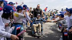 a_us_veteran_arriving_in_normandy_last_year_on_the