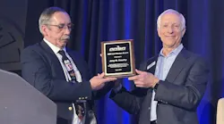 Jerry Crowley, right, receives the Leo Weston Award from Marshall Filler during ARSA’s 2025 Annual Conference.