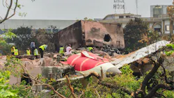 An investigation team inspects the wreckage of Air India flight 171 a day after it crashed in a residential area near the airport, in Ahmedabad on June 13, 2025. Investigators recovered a black box recorder from the crash site on June 13 of a London-bound passenger jet that plowed into a residential area of India's Ahmedabad city, killing at least 265 people on board and on the ground. (Sam Panthaky/AFP/Getty Images/TNS) An investigation team inspects the wreckage of Air India flight 171 a day after it crashed in a residential area near the airport, in Ahmedabad on June 13, 2025. Investigators recovered a black box recorder from the crash site on June 13 of a London-bound passenger jet that plowed into a residential area of India's Ahmedabad city, killing at least 265 people on board and on the ground. (Sam Panthaky/AFP/Getty Images/TNS)