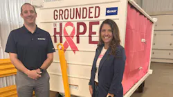 Joey Sisser and Angie Betterman from the FAST Global Solutions GSE Sales Team pose with the Grounded for Hope baggage cart that will be autioned off at the International GSE Expo in Las Vegas this week. Joey Sisser and Angie Betterman from the FAST Global Solutions GSE Sales Team pose with the Grounded for Hope baggage cart that will be autioned off at the International GSE Expo in Las Vegas this week.