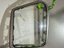 An Embraer 175 window before being reworked by Clear 4 Take Off. An Embraer 175 window before being reworked by Clear 4 Take Off.