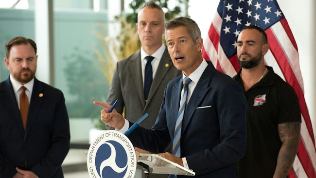 U.S. Dept. of Transportation Secretary Sean Duffy speaking alongside air traffic controllers union leaders at LaGuardia Airport in New York. (Evan Simko-Bednarski/New York Daily News/TNS)