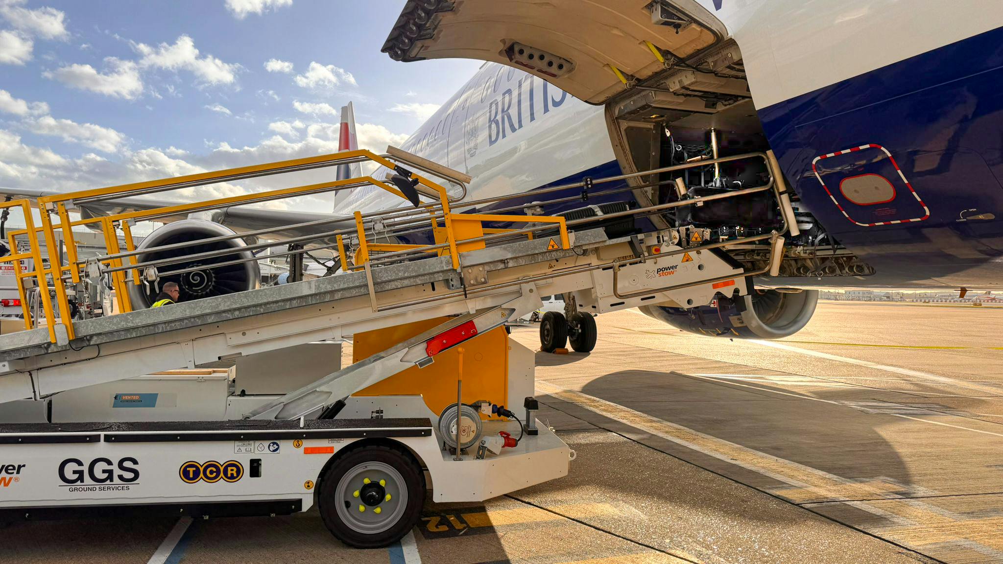 6908c00b0ce90c1964d0b07b Gatwick Ground Services Power Stow Belt Loader