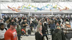 Travelers wait in line at a security checkpoint at George Bush Intercontinental Airport in Houston, Texas on Nov. 7, 2025. Hundreds of flights were canceled across the United States on Friday after the Trump administration ordered reductions to ease strain on air traffic controllers who are working without pay amid congressional paralysis on funding the U.S. budget. (Ronaldo Schemidt/AFP/Getty Images/TNS) Travelers wait in line at a security checkpoint at George Bush Intercontinental Airport in Houston, Texas on Nov. 7, 2025. Hundreds of flights were canceled across the United States on Friday after the Trump administration ordered reductions to ease strain on air traffic controllers who are working without pay amid congressional paralysis on funding the U.S. budget. (Ronaldo Schemidt/AFP/Getty Images/TNS)
