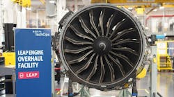 A large airplane engine sits next to a sign that reads, 'Delta TechOps LEAP ENGINE OVERHAUL FACILITY' A large airplane engine sits next to a sign that reads, 'Delta TechOps LEAP ENGINE OVERHAUL FACILITY'