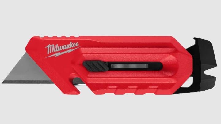 A black and red utility knife with a grey blade and a white logo on it that says 'Milwaukee'