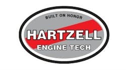 A grey oval with a red slash through it and text that reads: Built on Honor Hartzell Engine Tech' A grey oval with a red slash through it and text that reads: Built on Honor Hartzell Engine Tech'