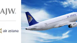 A white airplane flying against a blue sky next to two company logos that say, 'AJW Group' and 'Air Astana'