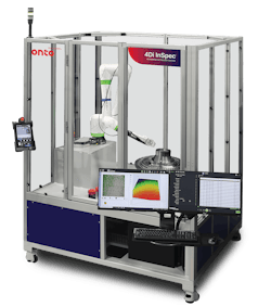 A large piece of equipment with screens and a robotic arm A large piece of equipment with screens and a robotic arm