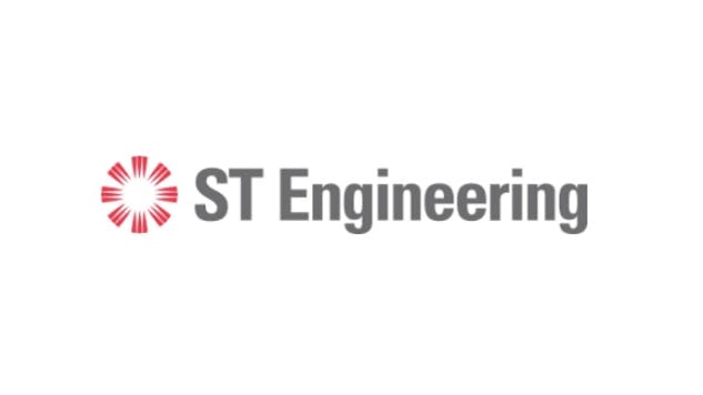 A circular red logo with gray text that reads: ST Engineering