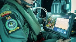 An air crew member in an Air Gunner uniform holding a tablet that shows maps and data An air crew member in an Air Gunner uniform holding a tablet that shows maps and data