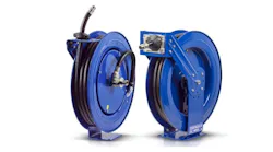 Two blue metal reels holding black hoses