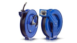 Two blue metal reels holding black hoses Two blue metal reels holding black hoses